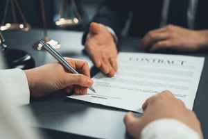 businessman signing contract