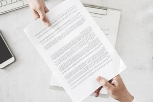 people sharing contract papers